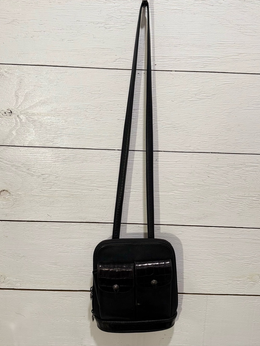 Vintage Brighton One World black leather crossbody w/ a croc-embossed fr pocket.